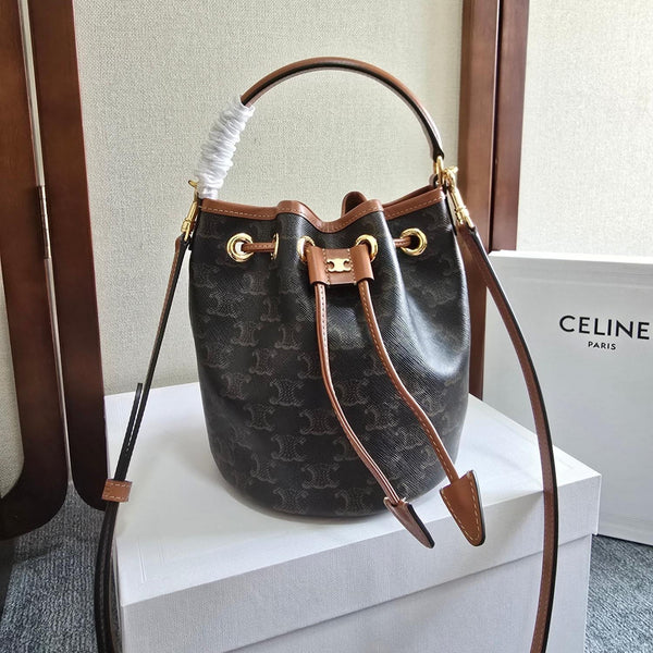 CLARA BAG 19 IN BLACK TRIOMPHE CANVAS AND BROWN CALFSKIN TRIM